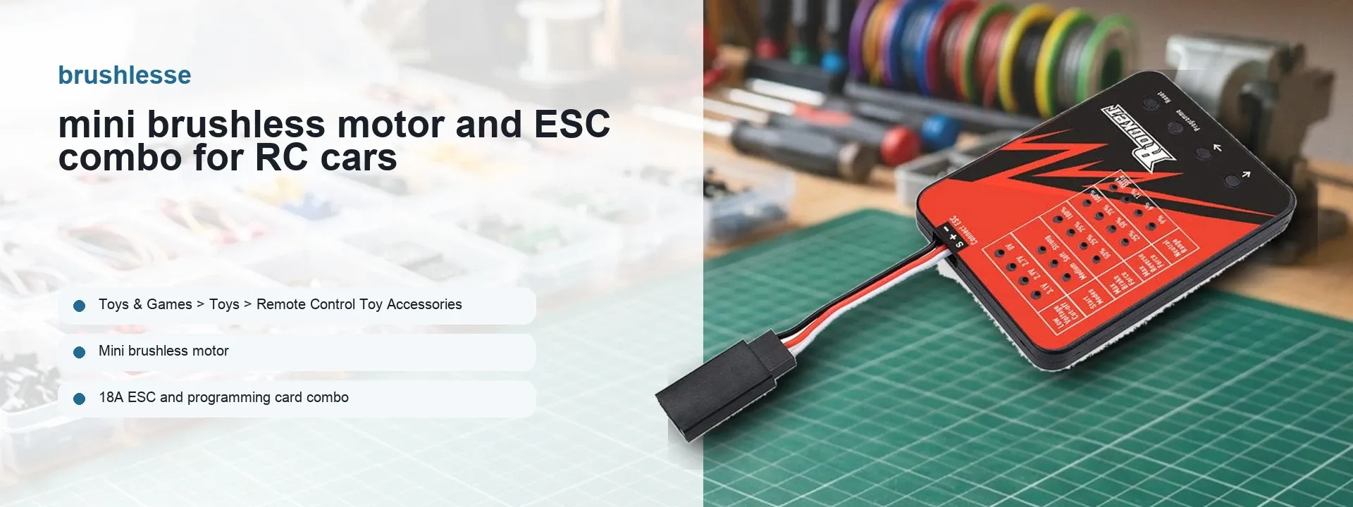 Mini brushless motor and 18A ESC programming card combo for RC cars, shown on a workbench with a green cutting mat.